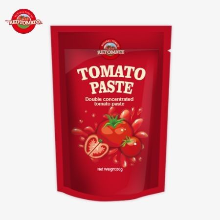 Kantong berdiri berisi 80 g pasta tomat terkonsentrasi ganda yang ditawarkan dengan tingkat kemurnian yang bervariasi dari 30% hingga 100%